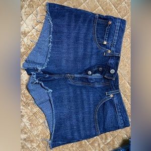 Levi’s, size 30. Dark wash and distressed